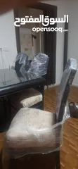  4 طاولة سفره شبه جديده 8 كراسي مع زجاجه للوجه  قابله للتفاوض لايوجد اي كسر