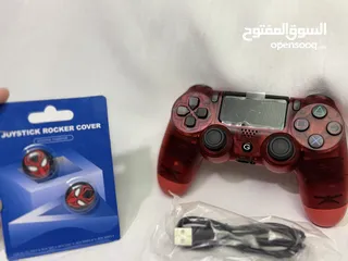  2 ايادي بلايستيشن 4 كوبي نخب اول مع شاحن و جوي ستيك  يوجد لونين ازق وأحمر