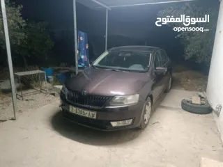  2 سكودا رابيد يد 1