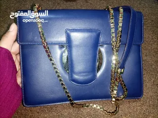  2 Salvatore Ferragamo bag made of soft leather, made in Italy  حقيبة سلفاتوري فيراغامو مصنوعة من الجلد