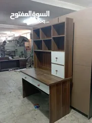  7 مكتب ومكتبة دراسية