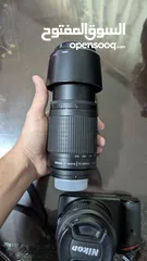  7 كاميرا نيكون DSLR D3200 مع عدستين 300 ميليمتر و55 ميليمتر