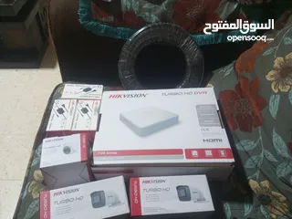  2 كاميرات مع ديفي ار جميع الوصلات جديد غير مستعمل هارد ديسك 1تيرا