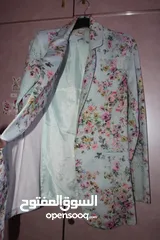  4 بليزر نسائي مُزهر بأكمام طويلة بقصة رسمية