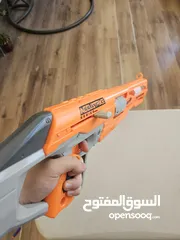  7 accustrike toy blaster with 5 bullets, 4 similar and 1 diffent