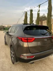  5 كيا سبورتاج فل الفل Gt مختم 2000ديزل 4*4 غرفة بني بنوراما سعرر حررررق