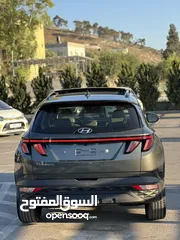  7 هونداي توسان هايبرد  بلاك ايديشن كامل الاضفات لون مميز  سنة الصنع 2022