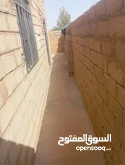  13 منزل في أم درمان الحاره 67 الأم مساحته 130 متر يفتح في ميدان فيهو سور خارجي متصل بالبيت 3 غرف وصالون