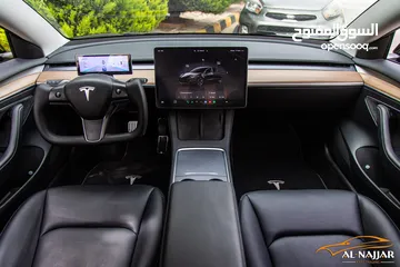  21 Tesla Model 3 2023 Standard plus   السيارة مميزة جدا و قطعت مسافة 7,000 كيلو متر فقط فقط