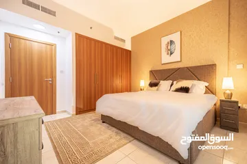  12 دبي لاند SKYCOURT  غرفة وصالة  مفروشة  سوبرلوكس مع بلكونه-إيجار شهري شامل