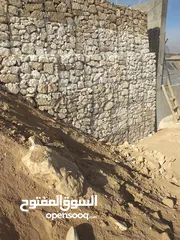  7 تركيب شبك وشيك وجابيون وربراب وإنشاء جدران حجرية