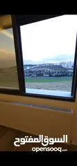  15 شقة مميزة طابق ثاني مساحة 206 م - طريق المطار - مقابل سوبر ماركت 911-سكن أ - شركة رمضان مميل للاسكان