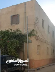  1 أرض سكنية في مدينة طرابلس منطقة بن عاشور خلف جامع عبدالغني علي واجهتين للبيع ،