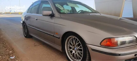  30 Bmw528i  جلد خمري كربون اصلي