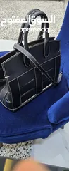 12 شنطة جلد طبيعي ( salvatore ferragamo calfskin thestudiocagebagsella) صناعة ايطالية