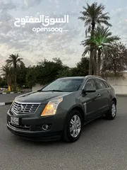  1 كاديلاك SRX صبغ الوكاله عداد 97 الف فقط