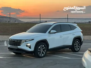  1 هونداي توسان/2022 فل الفل بدون فتحة سقف  2x4 ///240Hp بنزين + كهرباء  ( Haybrid) 1600cc