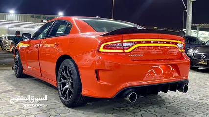  4 Dodge charger Model 2019 Color orange interior black passing guaranty