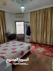  8 شقة أرضية مميزة للبيع في خلدا  - خلف الموفنبيك وقرب لاكي 210م مع حديقة وترسات 80م