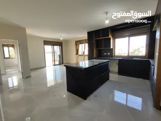  1 شقة جديدة سوبر ديلوكس للإيجار – عين منجد  قرب مطعم تغميسة