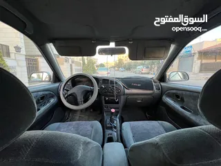  15 متسوبيشي لانسر موديل 1999 بحاله الوكاله