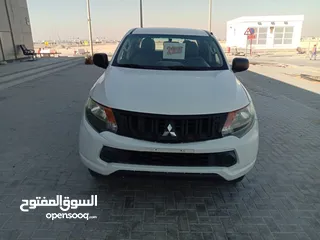  1 ميتسوبيشي L200 4\4 دبل كابينة زجاج كهرباء