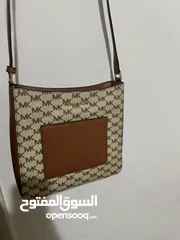  1 شنطة مايكل كورس الأصلية مستعملة بسيط