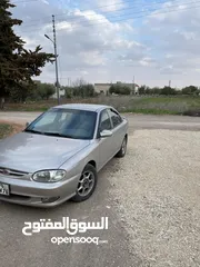  2 كيا تو 1998 فحص كامل 4 جيد ترخيص سنه  كوشوك جديد  السياره مش محتاجه لأي صيانه  ماتور1500 قير عادي