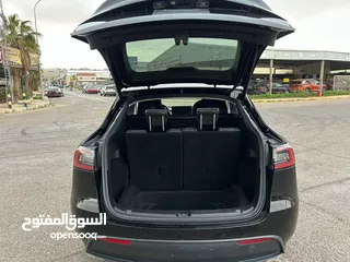  18 TESLA MODEL Y 2022 LONG-RANGE DUAL MOTOR-7 Seats  (سبع مقاعد)