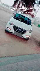  1 جب هونداي توسان موديل2014  لون ابيض ماشي 100الف مالك واحد  فل لفل عدا فتحة الجب كرتونة