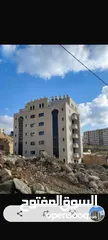  1 عماره  كامله للبيع 6 طوابق يوجد فيها 20شقه بيرزيت  مساحه الارض دونم