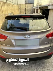  10 2009 ‏Hyundai توسان LX20 اربع ابواب، اللون فيراني، الكراسي جلد والسيارة 92,000 كيلو فقط وبحالة رائعة