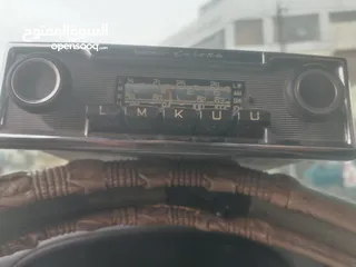  1 مسجل راديو بيكر كان راكب على مرسيدس.
