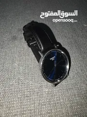  2 TISSOT Swiss