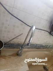 9 كيزر كهرباء مصري وفلتر ماء