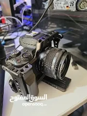  9 canon m50 with cage and adapter