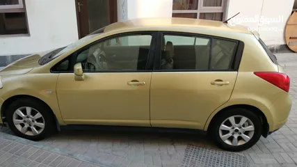  2 Nissan Tiida Saloon