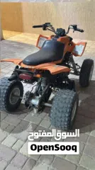  4 Arctic cat 300cc