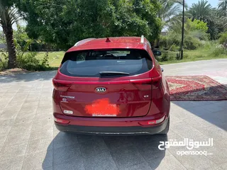  3 كيا سبورتاج موديل 2019 لون احمر مواصفات EX بصمة شاشة كبيرة نقطة عمياء كشن السائق كهرباء داخل بيجي