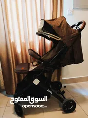  14 عرباية شارع للأطفال تتحول تخت قابله للطي -نوع كيدلو استخدم شهرين تتسع لطفليين