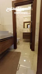  23 شقة ارضية مودرن في - عبدون - ثلاث غرف نوم اثنين ماستر و ترس وكراج (ID# : 2004)
