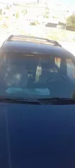  2 كيا سبورتاج موديل 2000 لون كحلي