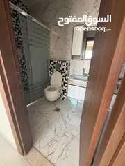  7 شقه غير مفروشه للايجار في عين مجد قرب مطعم تغميسه