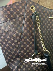  2 حقيبة يد نسائي مودرن حديثة ماركة ريدتاغ اللون البني المميز بلرسمة من الخليج