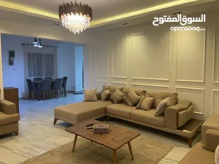  1 شقة مفروشة مودرن علي حمام سباحه قرب النيل بالدقي