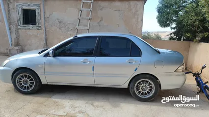  5 لانسر 2006 ماتور 16 اصلي للبيع