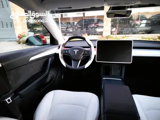  21 تيسلا 2022 فحص كامل 7جـــيـــد بدون ملاحظات داخلي ابيض لون مميز بحالة الوكالة للبيع بسعر لقطة ومحروق