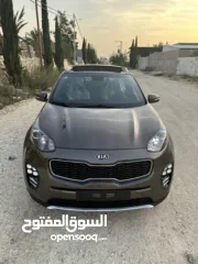  1 كيا سبورتاج فل الفل Gt مختم 2000ديزل 4*4 غرفة بني بنوراما سعرر حررررق