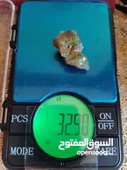  3 حجركريم اوبال ملتي كلر ناري Opal gemstone