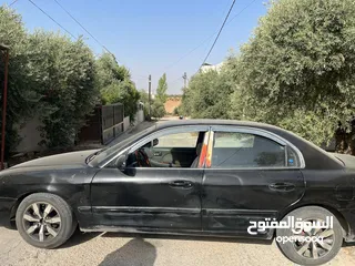  5 كيا اوبتيما 2002